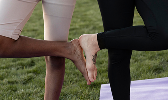 Women doing fitness outdoors together